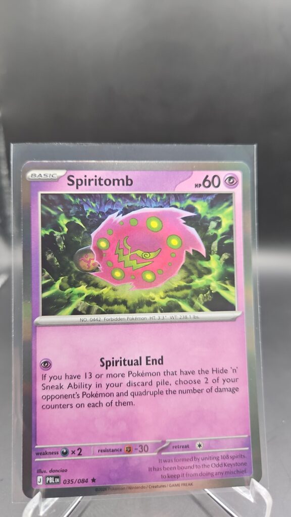 Spiritomb 035/084 Rare Holo Pokémon card from Pitch Black ME05 in Near Mint condition.