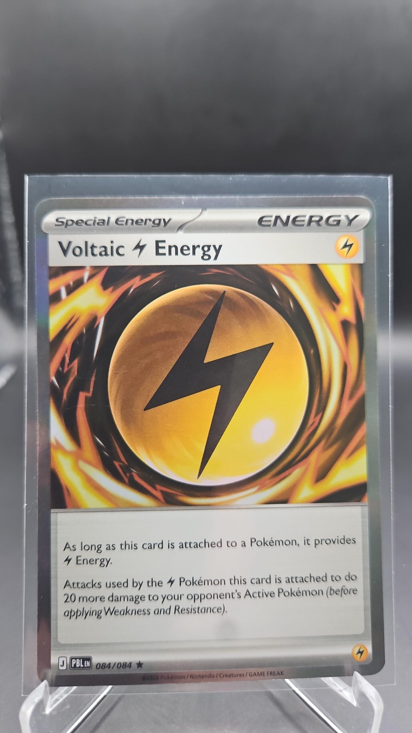 Voltaic Lightning Energy 084/084 Reverse Holo Pokémon card from Pitch Black ME05 in Near Mint condition.