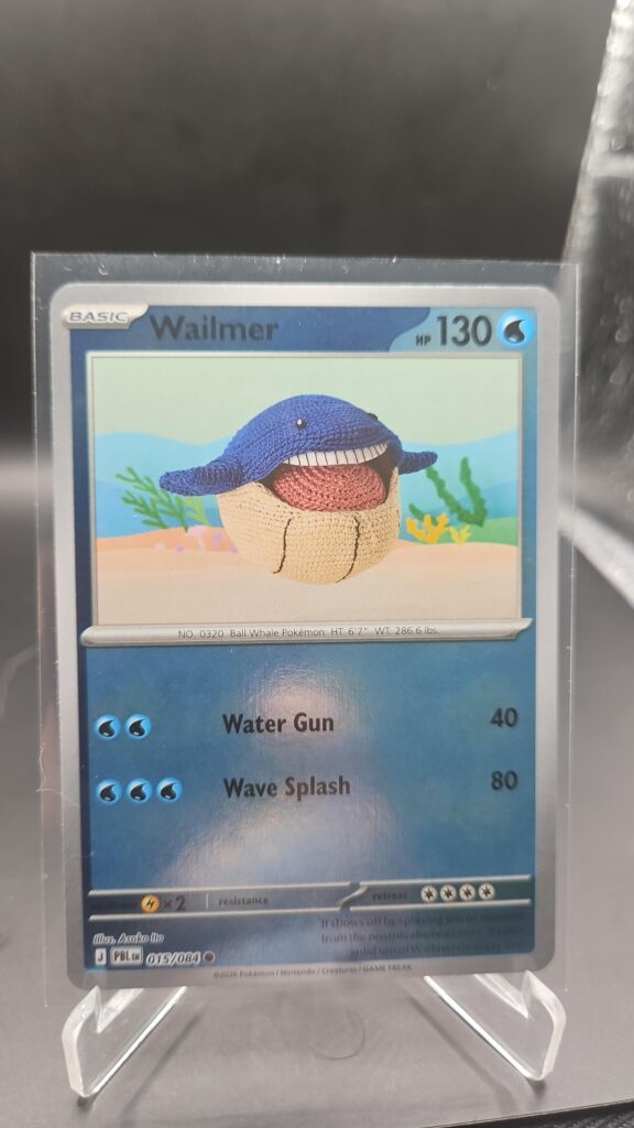 Wailmer 015/084 Reverse Holo Pokémon card from Pitch Black ME05 in Near Mint condition.