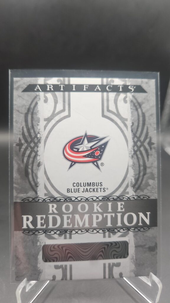 2026‑27 Artifacts Rookie Redemption RED‑208 Columbus Blue Jackets.