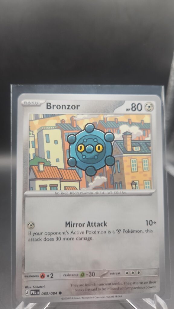 Bronzor 063/084 Base Common Pokémon card from the Mega Evolution Era Pitch Black ME05 set in Near Mint condition.