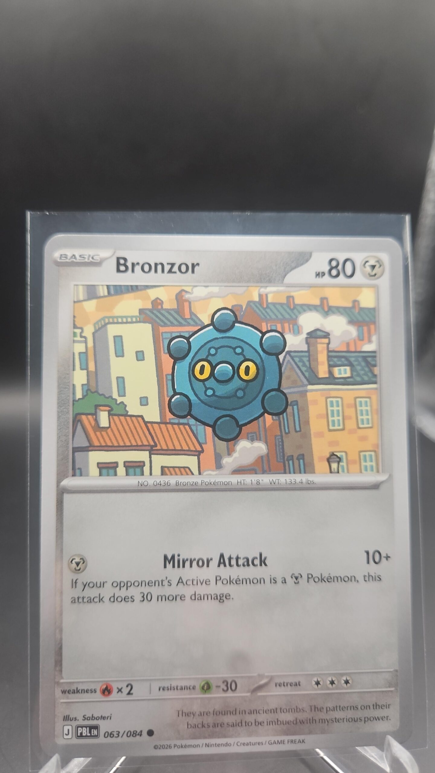 Bronzor 063/084 Base Common Pokémon card from the Mega Evolution Era Pitch Black ME05 set in Near Mint condition.