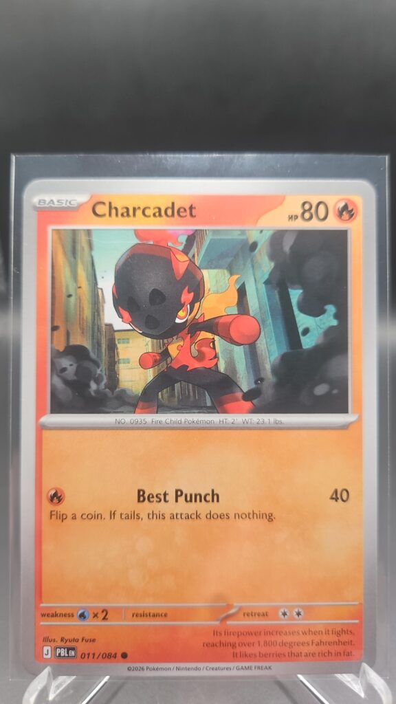 Charcadet 011/084 Base Common Pokémon card from the Mega Evolution Era Pitch Black ME05 set in Near Mint condition.