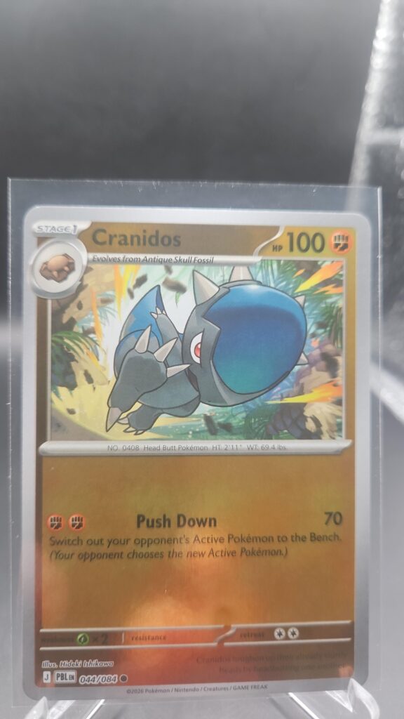 Cranidos 044/084 Reverse Holo Pokémon card from the Mega Evolution Era Pitch Black ME05 set in Near Mint condition.