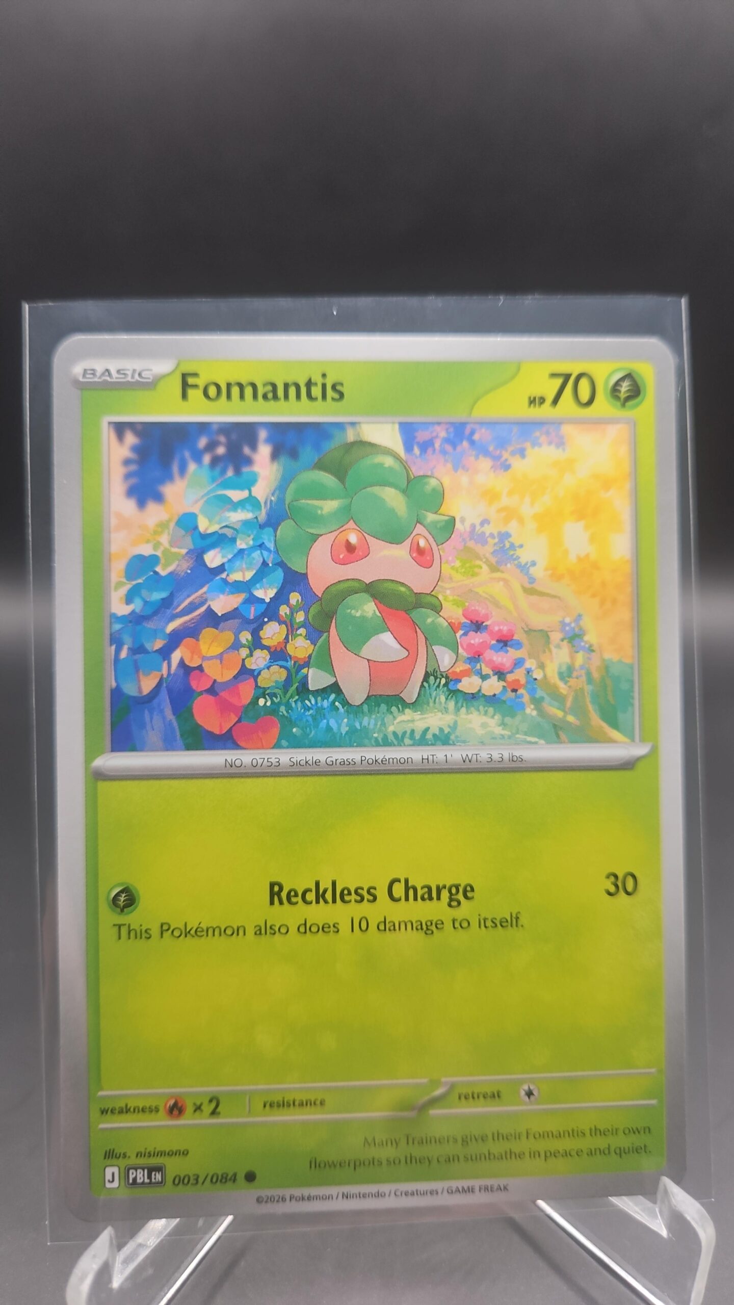 Fomantis 003/084 Base Common Pokémon card from the Mega Evolution Era Pitch Black ME05 set in Near Mint condition.
