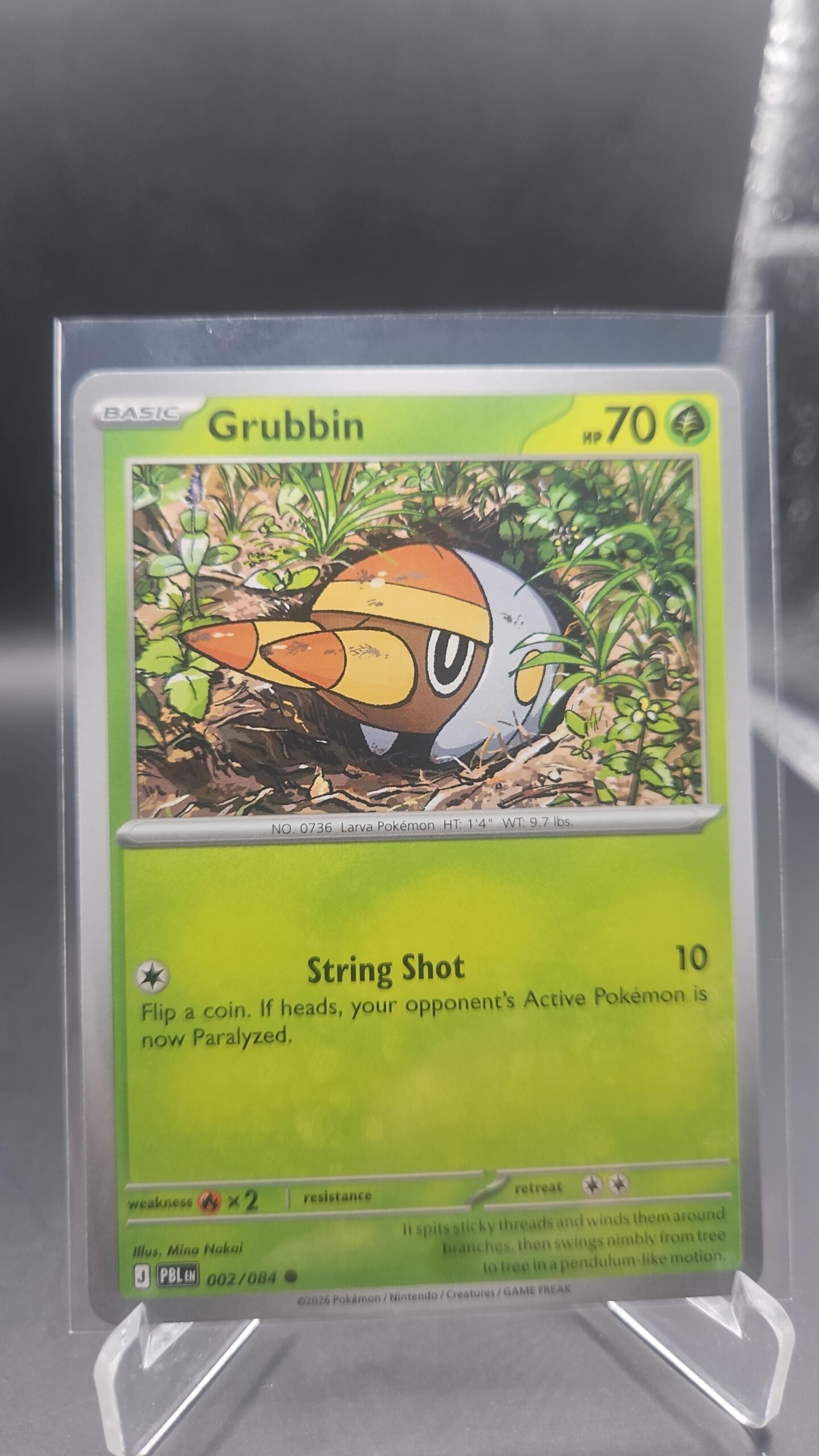 Grubbin 002/084 Base Common Pokémon card from the Mega Evolution Era Pitch Black ME05 set in Near Mint condition.