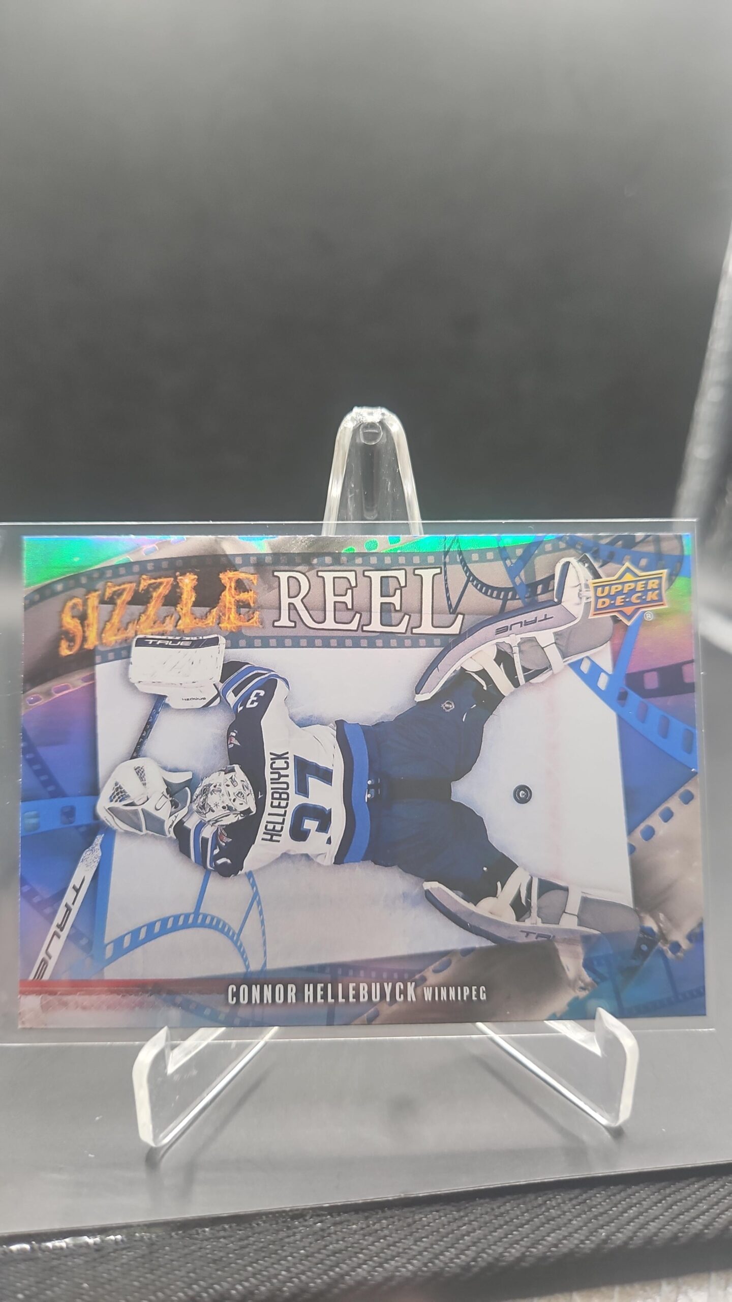 Connor Hellebuyck Sizzle Reel #SR‑56 card from 2025‑26 Upper Deck Series 2 in Near Mint condition.