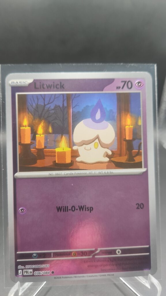 Litwick 036/084 Reverse Holo Pokémon card from the Mega Evolution Era Pitch Black ME05 set in Near Mint condition.