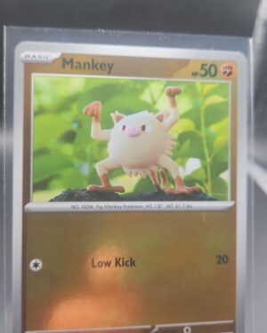Mankey 042/084 Reverse Holo Pokémon card from the Mega Evolution Era Pitch Black ME05 set in Near Mint condition.