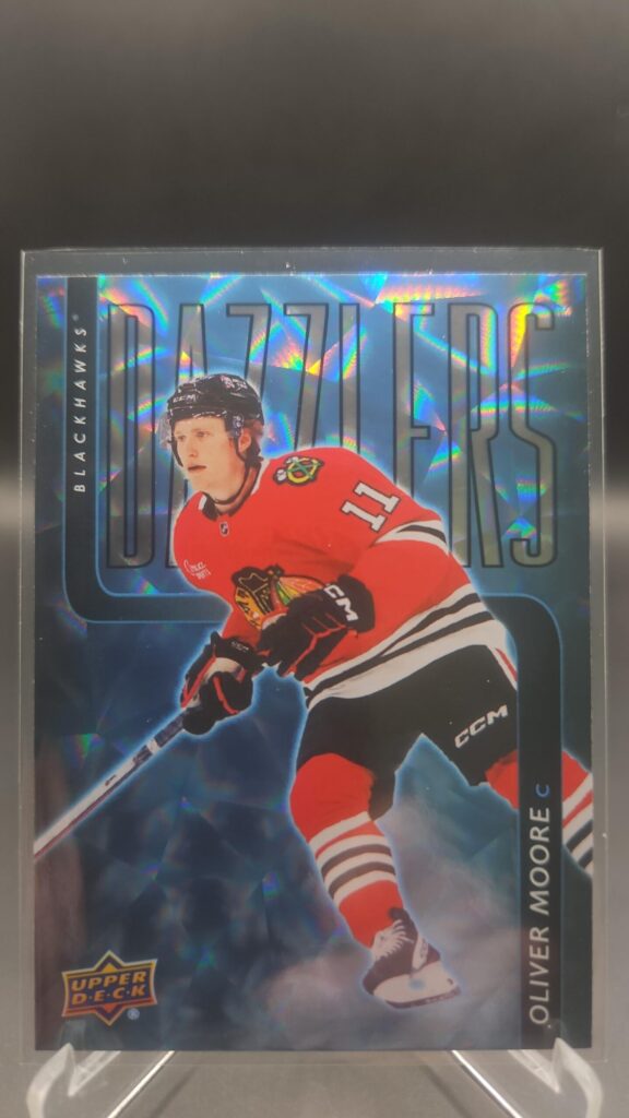 Oliver Moore Dazzlers Blue Rookie #DZ‑86 card from 2025‑26 Upper Deck Series 2 in Near Mint condition.