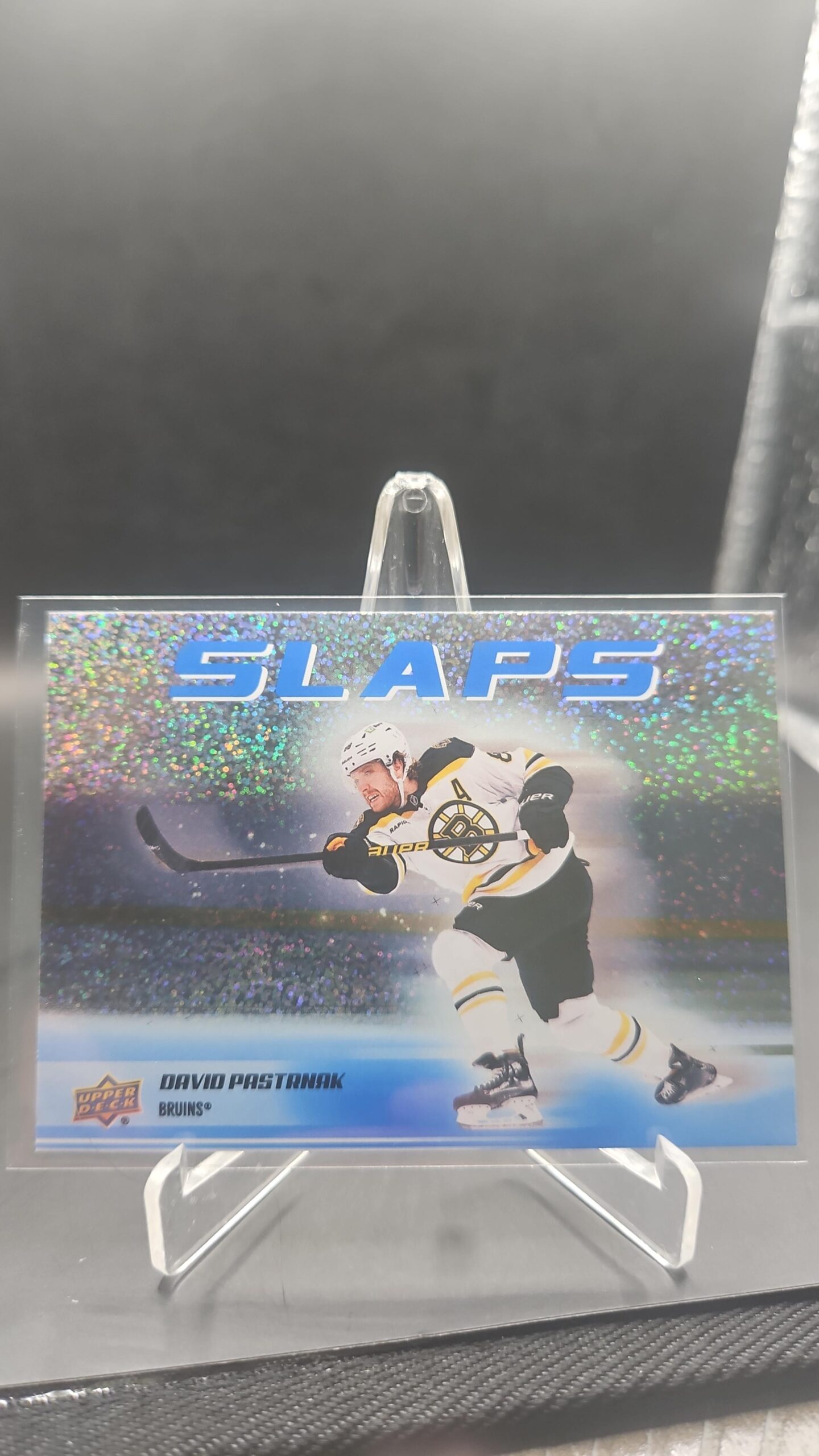 David Pastrnak Hockey Slaps Speckle #SL‑18 card from 2025‑26 Upper Deck Series 2 in Near Mint condition.