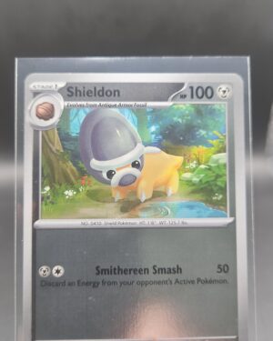 Shieldon 061/084 Reverse Holo Pokémon card from the Mega Evolution Era Pitch Black ME05 set in Near Mint condition.