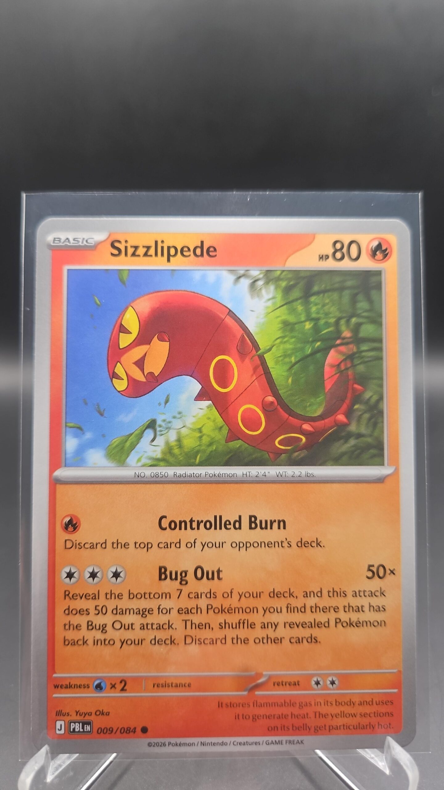 Sizzlipede 009/084 Base Common Pokémon card from the Mega Evolution Era Pitch Black ME05 set in Near Mint condition.